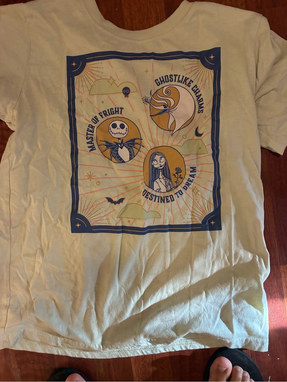 Disney Pale Yellow Short Sleeve Tee with Navy and Orange Night Graphic